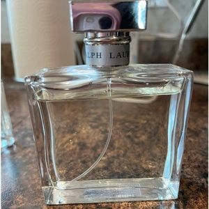 Ralph Lauren Romance perfume. 100 ml.  Small amount used.  Retails for 150$